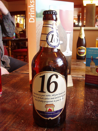 Ember Inns bottle An Ember Inns bottle table marker