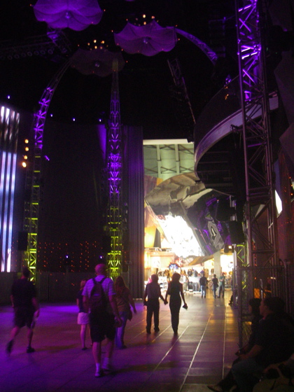 The Lobby with the shiny bits from the outside coming inside massive LED screen and odd floating unbrellas on the roof