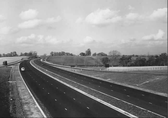 The M1, when it opened in all it's three lane glory back in 1959 - note the lack of crash barriers and even speed limits!