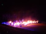 Drummers arrive with their drumsticks on fire at Cinescenie at Puy du Fou